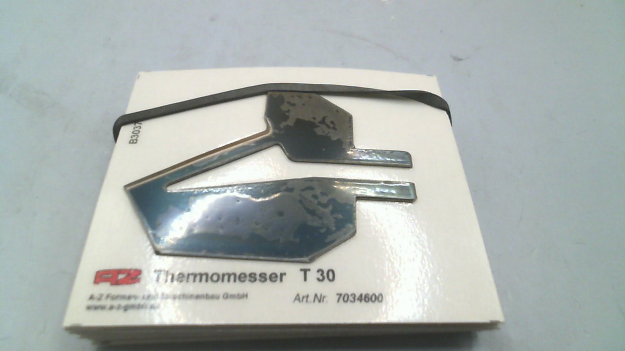 7034600