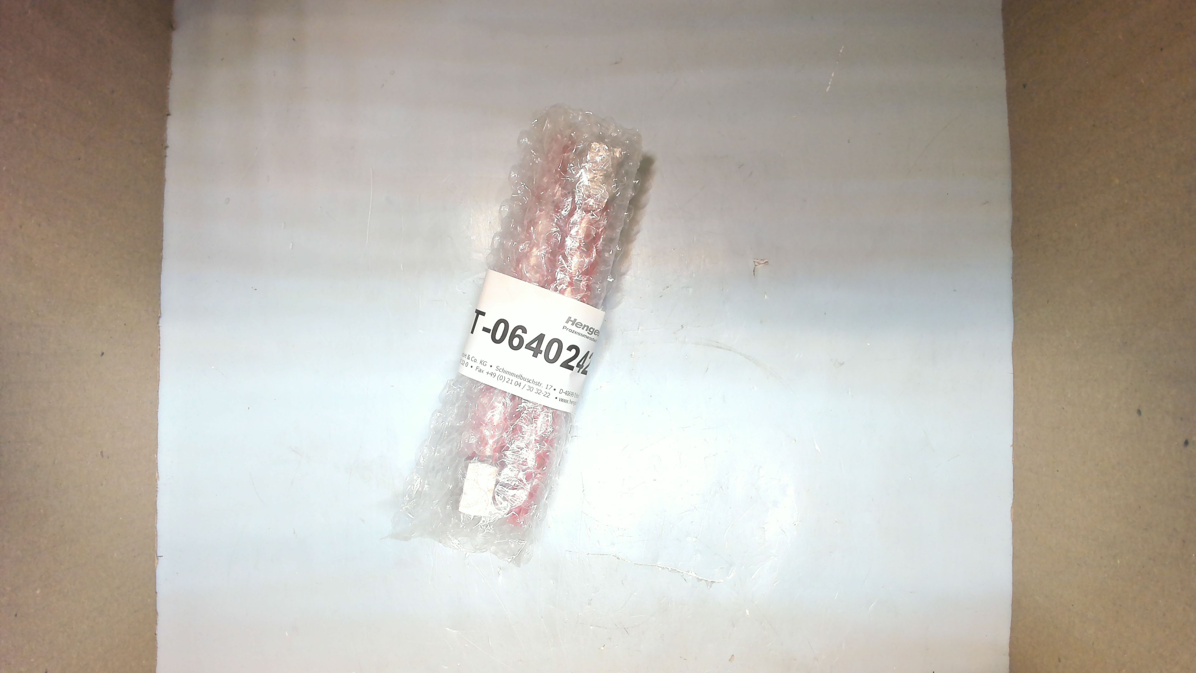 T-06402427