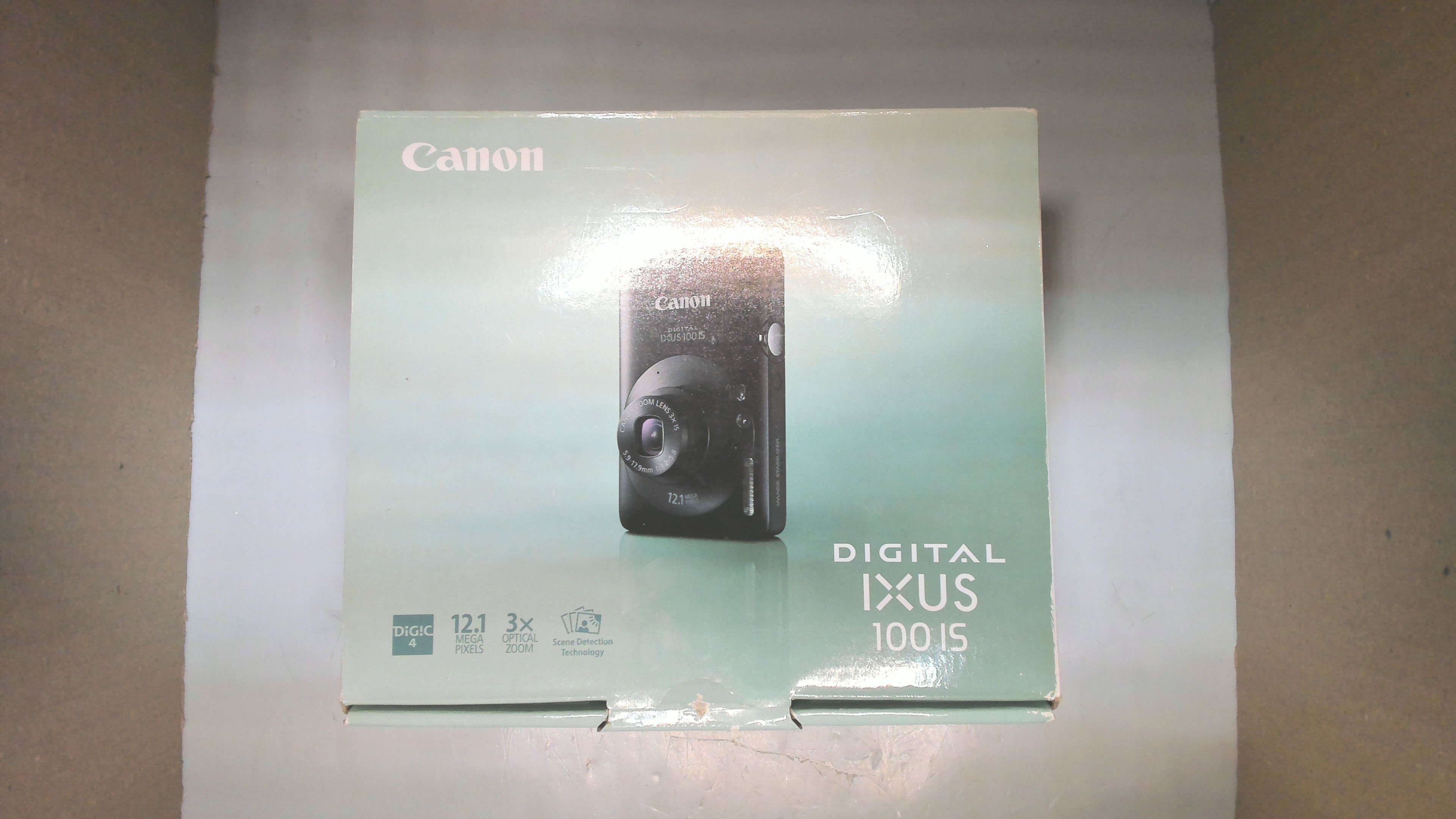 Canon Digital IXUS 100 IS Digitalkamera mit Sucher 12MP 3x opt.